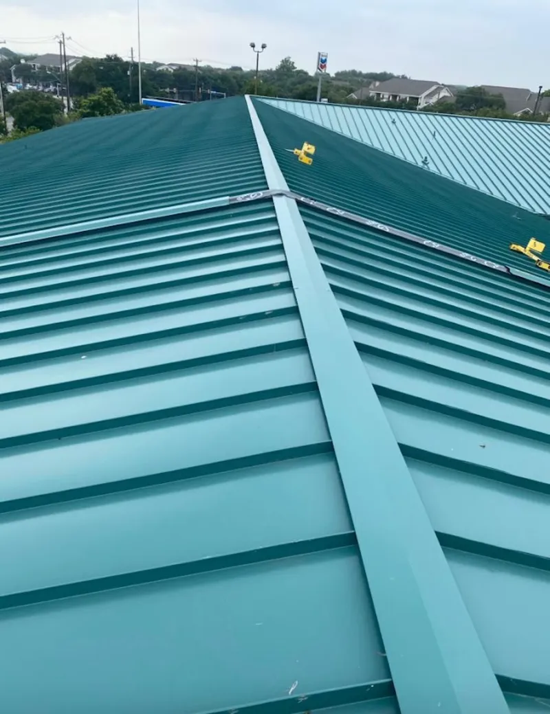 Green commercial metal roof ridge and valley for Metal Roof Repair in Oakland Park